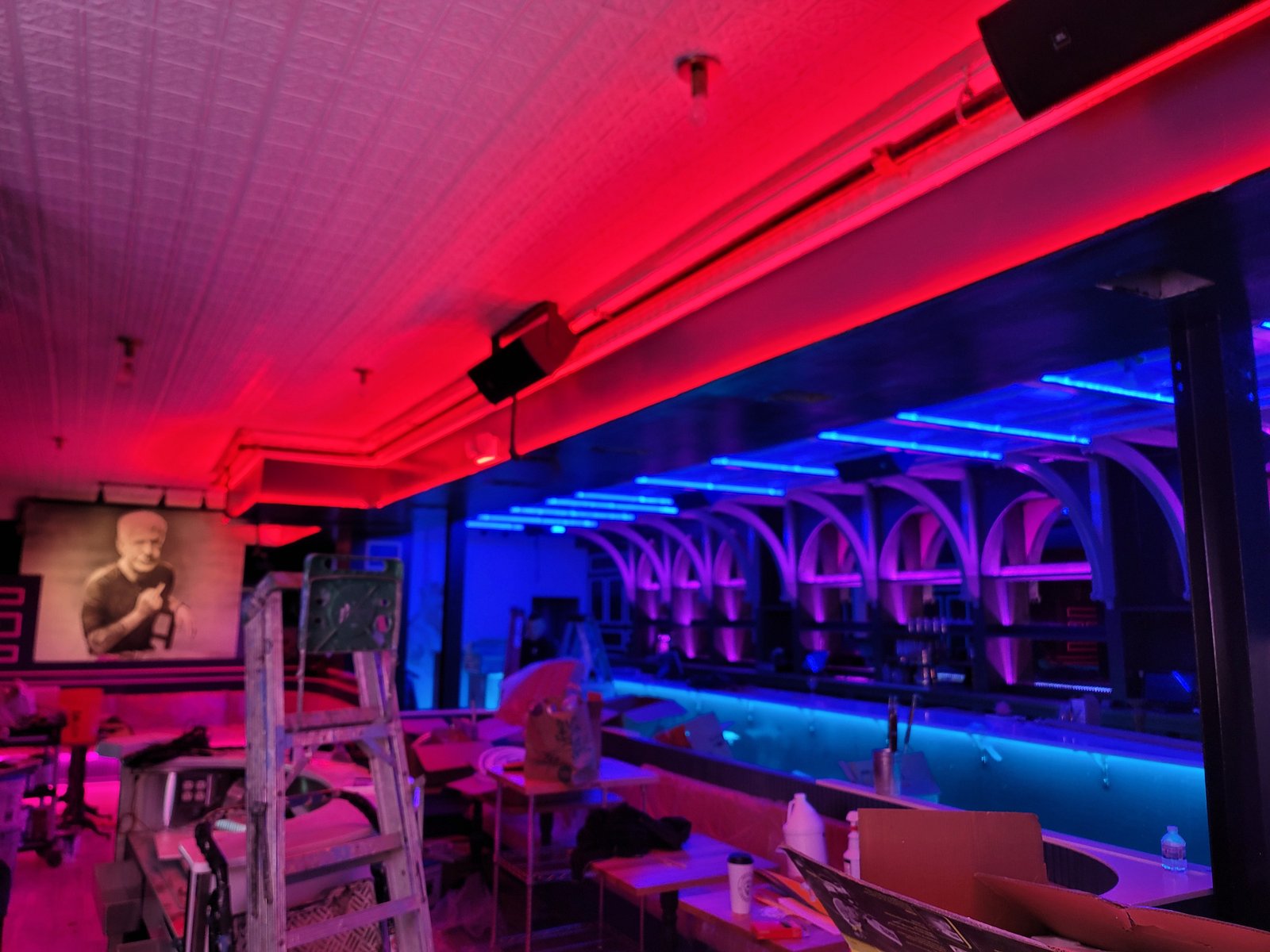 Bar and lounge with custom DMX LED lighting and professional sound system installed by JRO Solutions.