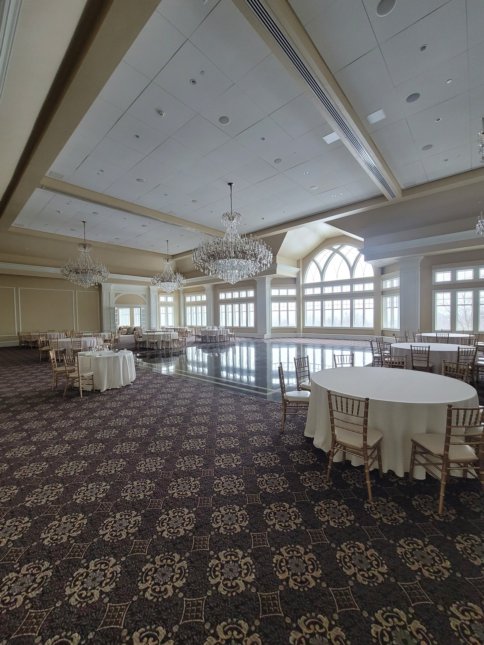 Banquet hall with ceiling speakers, lighting, and POS system installed by JRO Solutions.